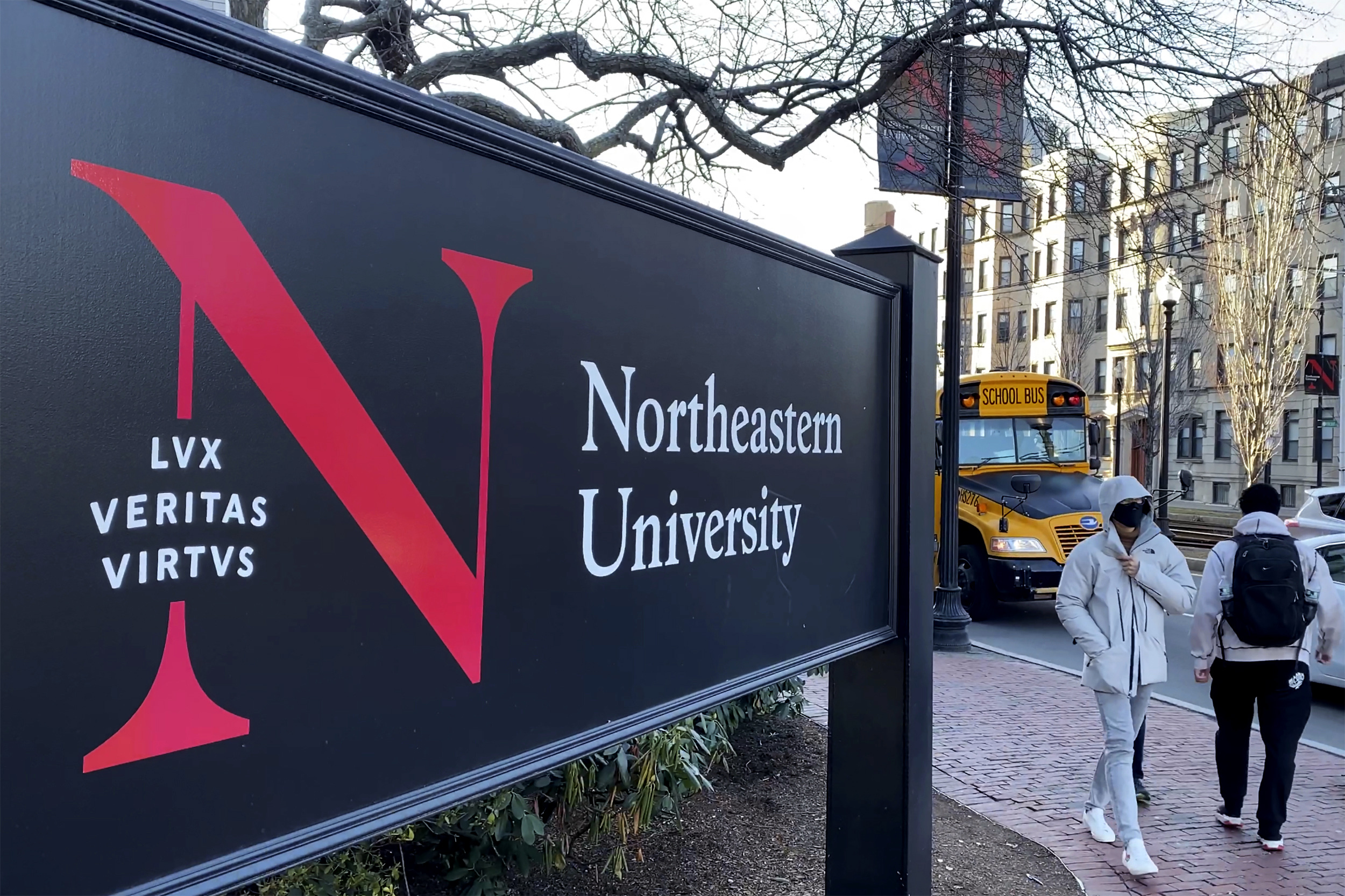 11646d99-2ccf-44f1-9fa5-ddb6006271ed Students walk on the Northeastern University campus in Boston