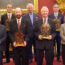 The Prince of Wales poses with trophy winners