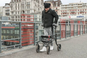 Paralysed men stand, walk and swim again thanks to new implant