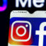 Facebook and Instagram logos displayed on a smartphone and Meta Platforms logo in the background