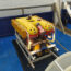 An underwater drone on a ship deck