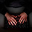 A file image of somebody using a laptop