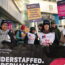 Workers on the picket line outside Queen Elizabeth hospital in Birmingham (Jacob King/PA)