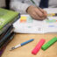 Teacher marking papers