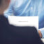 Businesswoman and candidate at office reading CV