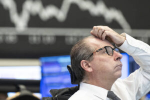 Bank stocks tumble but others rise on interest rate hopes
