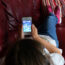 A child using a smartphone