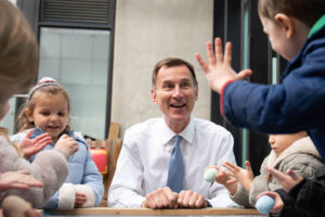 Hunt spends Budget windfall on childcare and tax breaks for wealthy pensioners