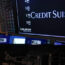 A sign displays the name of Credit Suisse on the floor at the New York Stock Exchange in New York, Wednesday, March 15, 2023