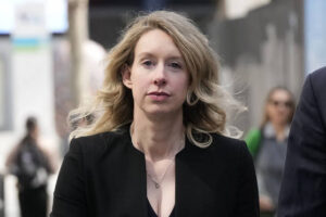 Disgraced Theranos boss Elizabeth Holmes returns to court in bid to avoid prison