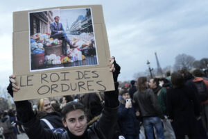 Paris streets calm after pension reform protests as rubbish piles up