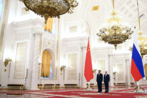 Putin hosts Xi in the Kremlin with imperial palace pageantry