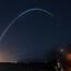Spectators at Jetty Park in Cape Canaveral watch as Terran I, a 3D-printed rocket by Relativity Space, lifts off from Cape Canaveral