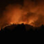 A forest fire burns in the hills near Villanueva de Viver, Spain, in the early hours of Friday March 24 2023