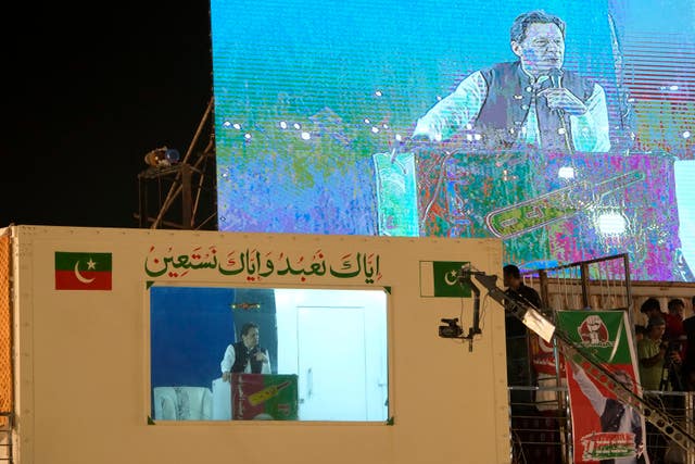 Mr Khan was protected by a bulletproof barrier