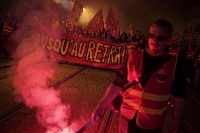 c4546872d724478097486656712f6efc Railway workers hold a banner reading ‘Until withdrawal’ during a demonstration in Lyon, central France, on Wednesday