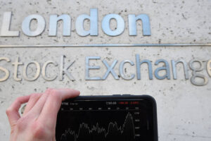 FTSE 100 hits record high as economy fears ease