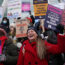 Protesters on a picket line outside University College Hospital, London