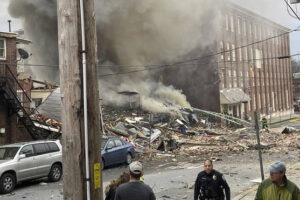 Rescuers search for four missing after three killed in chocolate factory blast