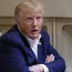 Former President Donald Trump speaks with reporters