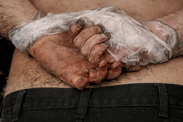 60f00386f0364049843d06e880033df7 The body of a man who was killed with his hands tied behind his back lies on the ground in Bucha, Ukraine, in April 2022