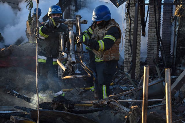 71fa59a7c10d49c9a5909359eef43e3b Members of the Ukrainian State Emergency Service clear the rubble at a building destroyed by a Russian strike in the Zaporizhzhia district, Ukraine