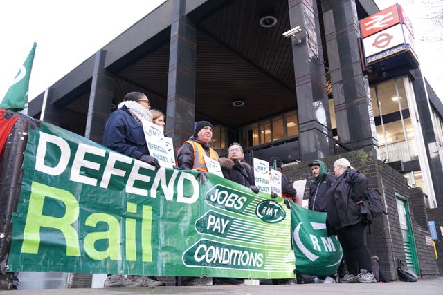 2-70463648 Members of the Rail, Maritime and Transport union on the picket line