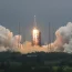 China says the central rocket segment that launched the 22.5-ton core of China's newest space station into orbit burned up as it re-entered Earth's atmosphere early on Sunday