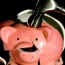 A piggy bank being smashed
