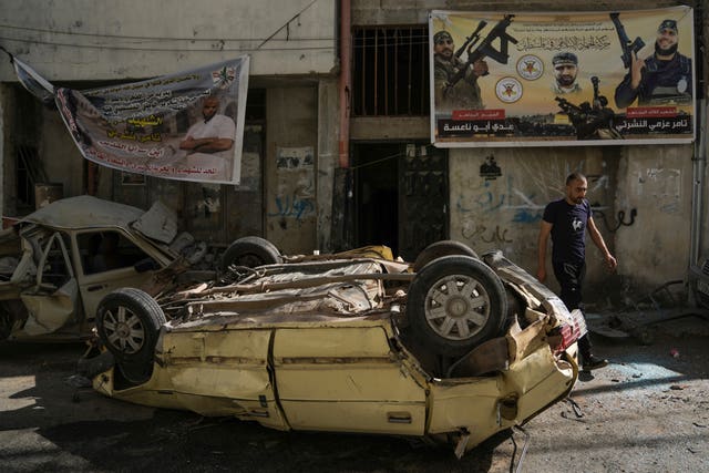 004d05bceca142d18ed15f891e628ec2 Overturned car in Jenin