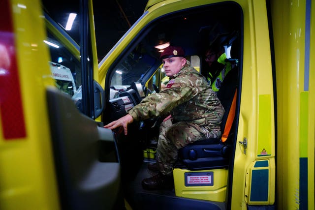 2-70339238 Soldiers preparing to provide support for ambulance crews during the strike