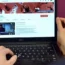 The home page of YouTube displayed on a laptop computer