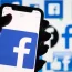 Facebook logo on phone