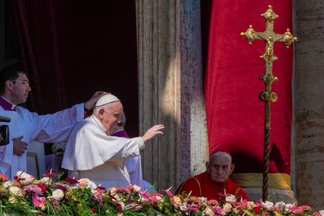 3dc838f3e57d467bbe15adfe299a6e0e Pope Francis waves from the central lodge of St Peter’s Basilica at the Vatican at the end of the Easter Sunday Mass