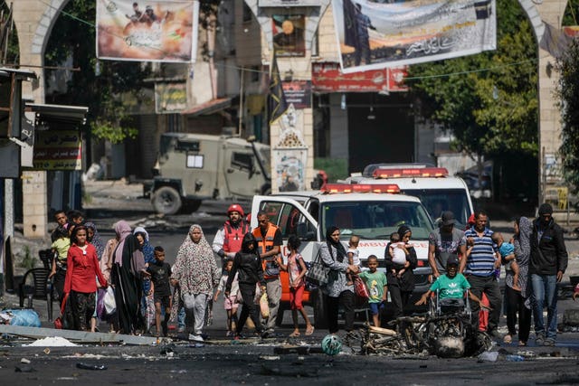 3e8b2964c6984688b46793e1a914a313 Residents of the Jenin refugee camp flee their homes