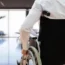 A person in a wheelchair at an airport