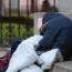 A homeless person sleeping outside in London