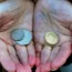 A woman holding coins