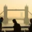 Commuters in central London as they cross London Bridge