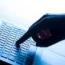 A hand on a laptop