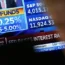 Traders work on the floor at the New York Stock Exchange