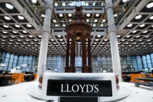 Lloyds of London slides to loss as £21bn handed to customers