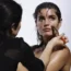 A woman being tanned