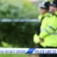 Police officers and police tape