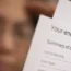 A dismayed person reading an energy bill