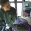 Dillon Reeves grabs the steering wheel on his school bus