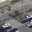 In this frame grab from video provided by WFAA, people are evacuated from Allen Premium Outlet, Saturday, May 6, 2023, in Allen, Texas. Law enforcement responded to reports of a shooting at the outlet