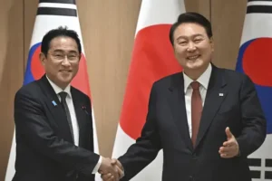 South Korean and Japanese leaders meet again to improve ties