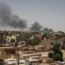 Smoke rises over Khartoum