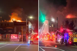 At least six dead and dozens unaccounted for as fire rips through New Zealand hostel